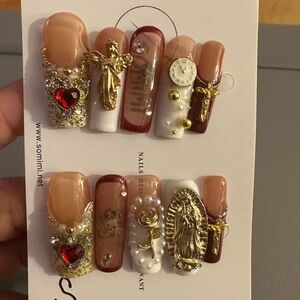 Elegant Nail Art Set with Gold and Red Accents